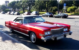 Rent Cars and Buses: Cadillac Eldorado Red